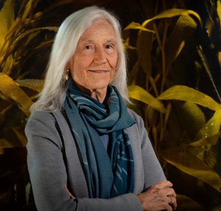 Julie Packard, Executive Director, in front of the Kelp Forest exhibit